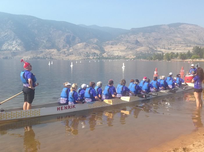 Our team in a dragon boat waiting to head out for a race.